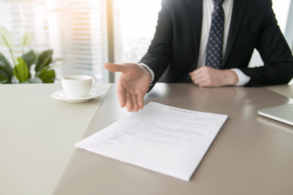 lawyer presenting documents for franchise laws in USA
